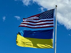 The image of American and Ukrainian flags