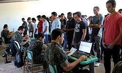 Young men presenting themselves for the military selection phase in Brazil.