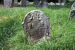 Headstone of Hugh McKenna who died on 7 May 1723, aged 58 years. Errigal Truagh Graveyard.