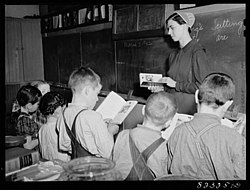 Mennonite teacher holding class in one-room, eight grade school house. Hinkletown, Pennsylvania, 1942.