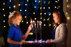 Kids celebrating Hanukkah