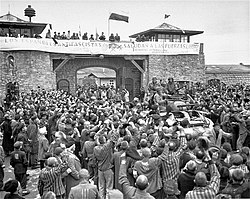 Holocaust survivors cheer the soldiers of the 11th Armored Division of the U.S. Army one day after their actual liberation. Mauthausen, Austria